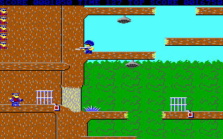 Bionic Commando MS-DOS gameplay showing grappling arm traversal