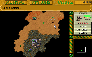 A massive tank force moving across desert terrain toward an enemy base.