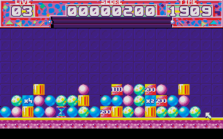 Pick 'n Pile gameplay screen showing columns of shapes and symbols