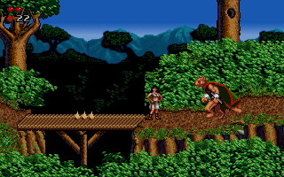 Elandra firing magic fireballs across a cavern platform