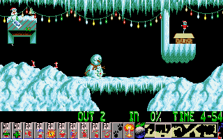Lemmings in Santa suits navigating a snowy level