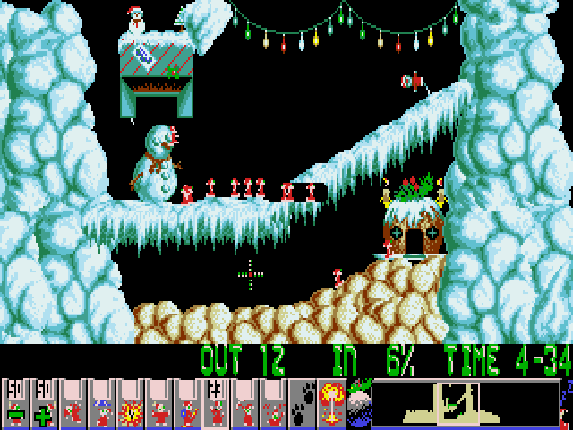 Lemmings in Santa outfits navigating a snowy level